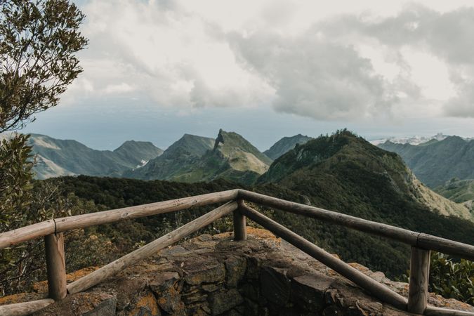 Amazing view of peaks of hills and cloudy sky