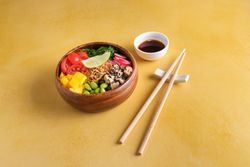 Healthy bowl with chopsticks and soy sauce