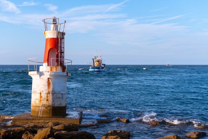 Lighthouse on rocky coastline
