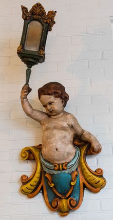 Sconce of baby in the Greenbrier historic resort hotel, West Virginia