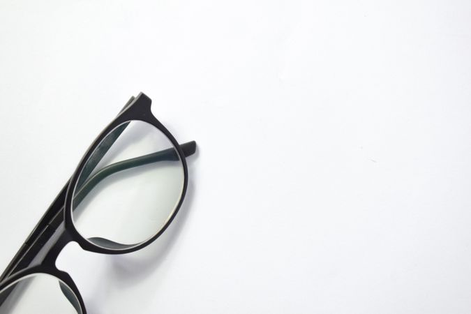 Glasses on plain background with copy space