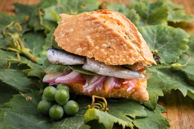 Traditional harvest sandwich with sardines, meat and different v