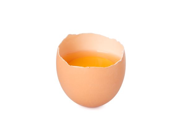 Half broken egg with yolk isolated on blank background