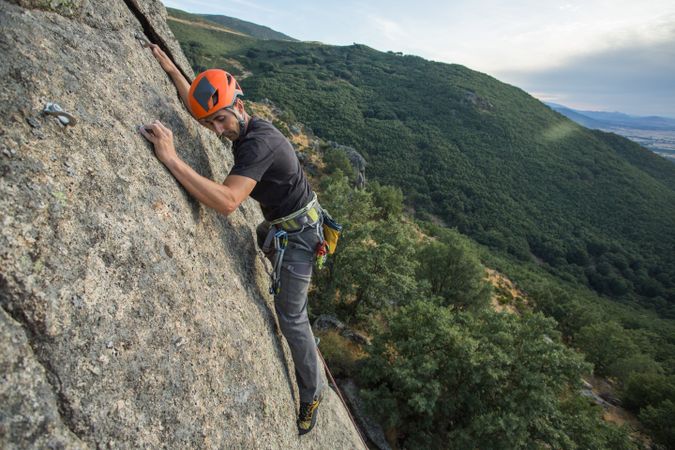 Man climbing a rock