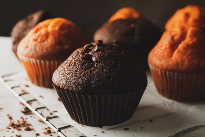 Composition with tasty muffins on wooden background