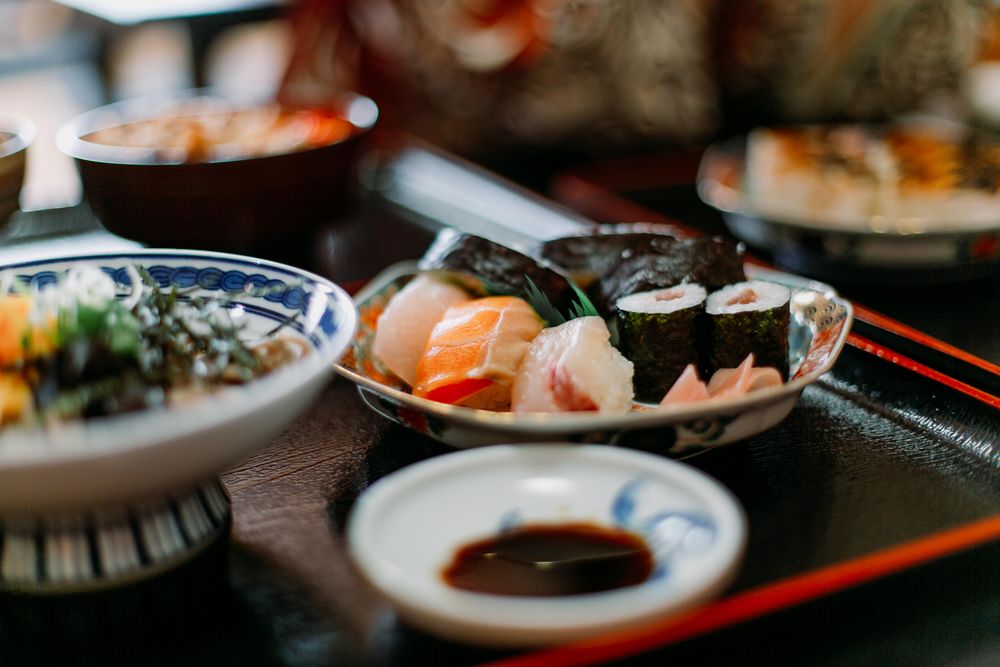 Sushi and salad on plates