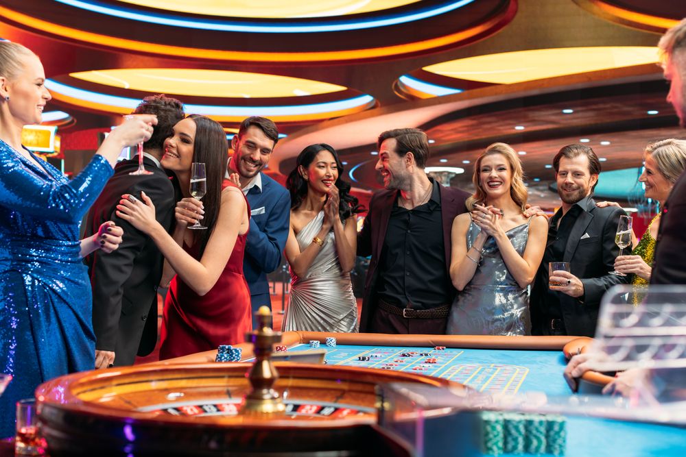 Successful Men and Women Partying in a Luxurious Casino.