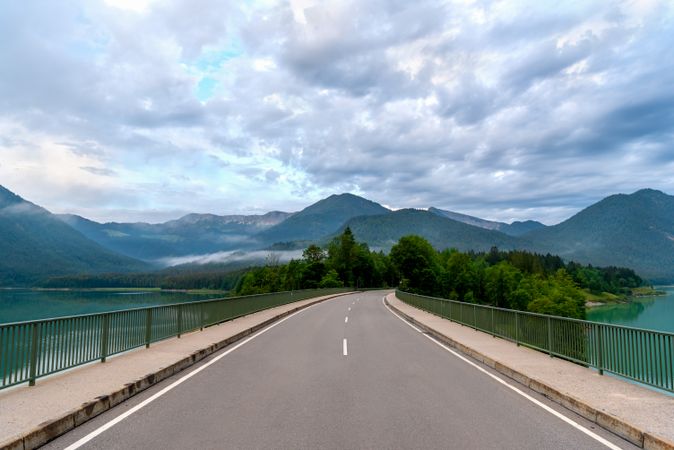 Sylvenstein Lake Bridge and the Bavarian Alps at the horizon, on a sunny day in summer