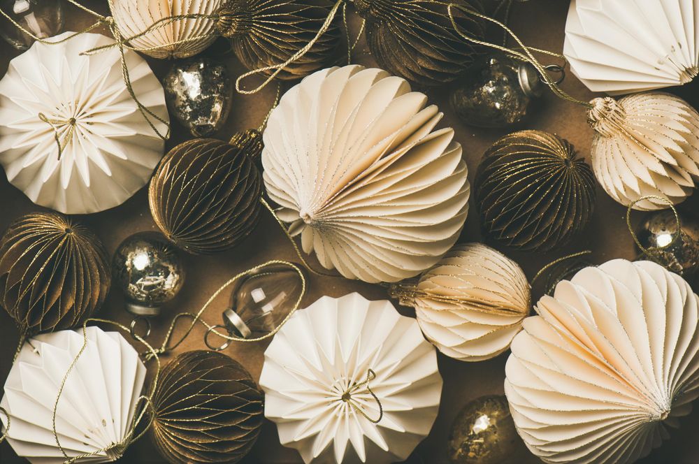 Gold and cream folded tree ornaments, and baubles