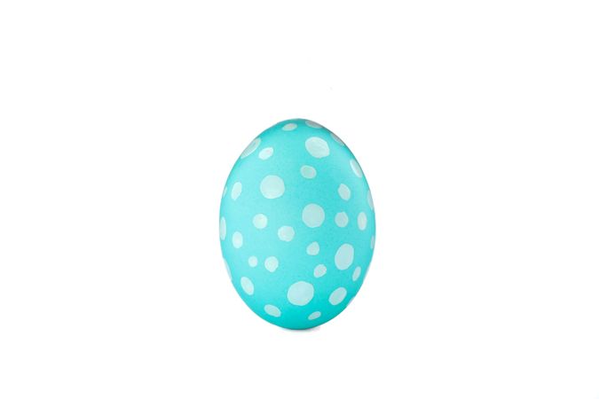 Decorative easter egg isolated on light background. Festive tradition