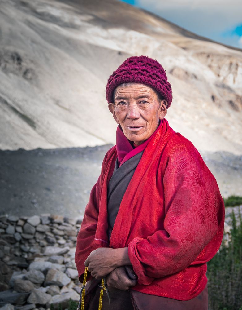 Tibet - August, 29 2014: Older Tibetan man in mountainous region