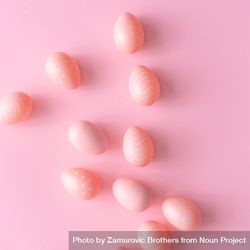 Pink Easter eggs on pink table bxEav0