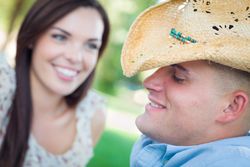 Happy Smiling Couple Talking in the Park.