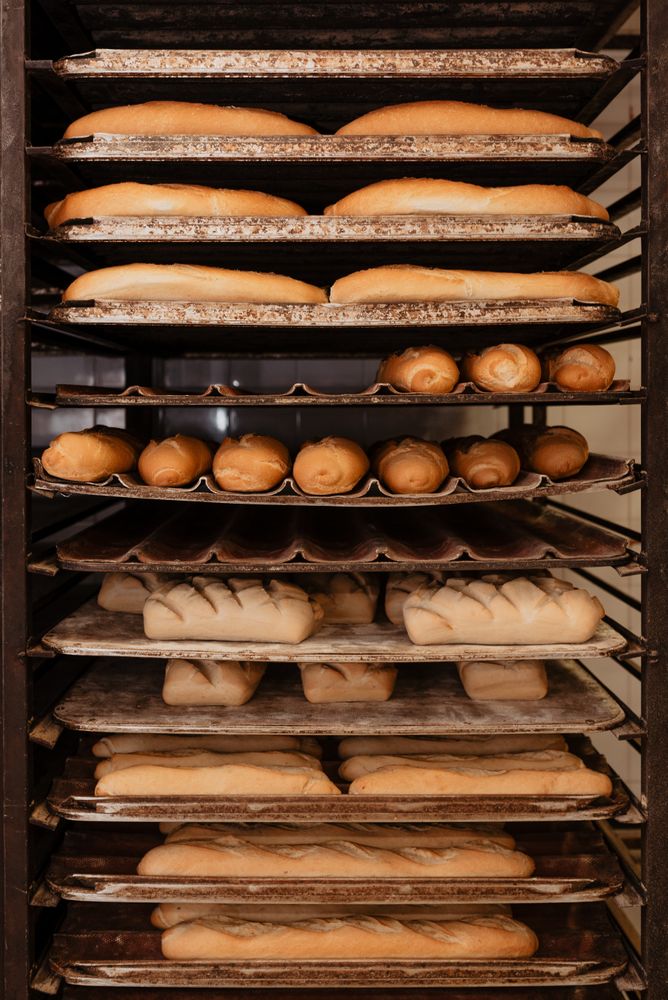 Shelves with fresh bread and buns