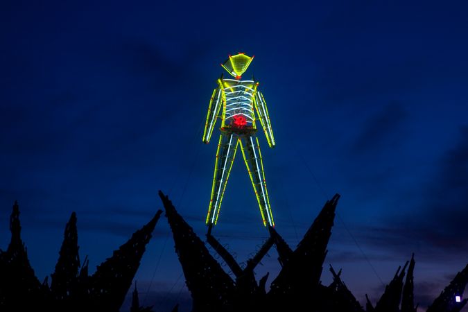 Art installation of neon man at "Burning Man,” Burning Man, Nevada