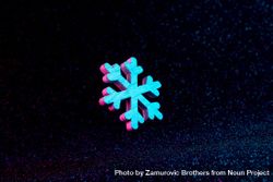Snowflake in vivid neon colors on dark  background 43wGO4