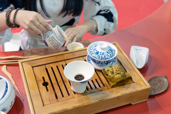 Woman performing Chinese tea ceremony