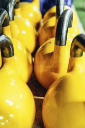 Bright yellow weights in gym