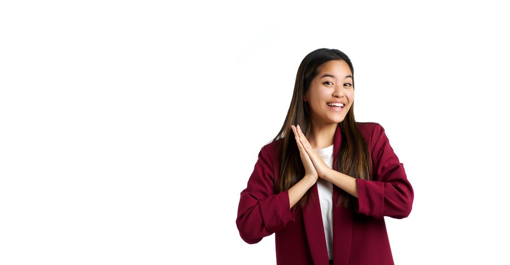 Portrait of a deeply moved Asian woman isolated