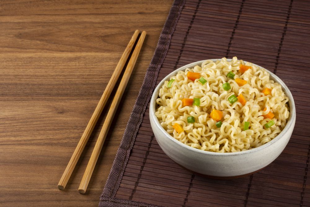 Bowl with instant noodles on the table.