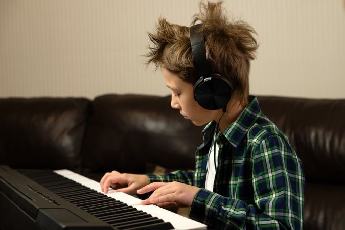 Focused Child Playing Piano