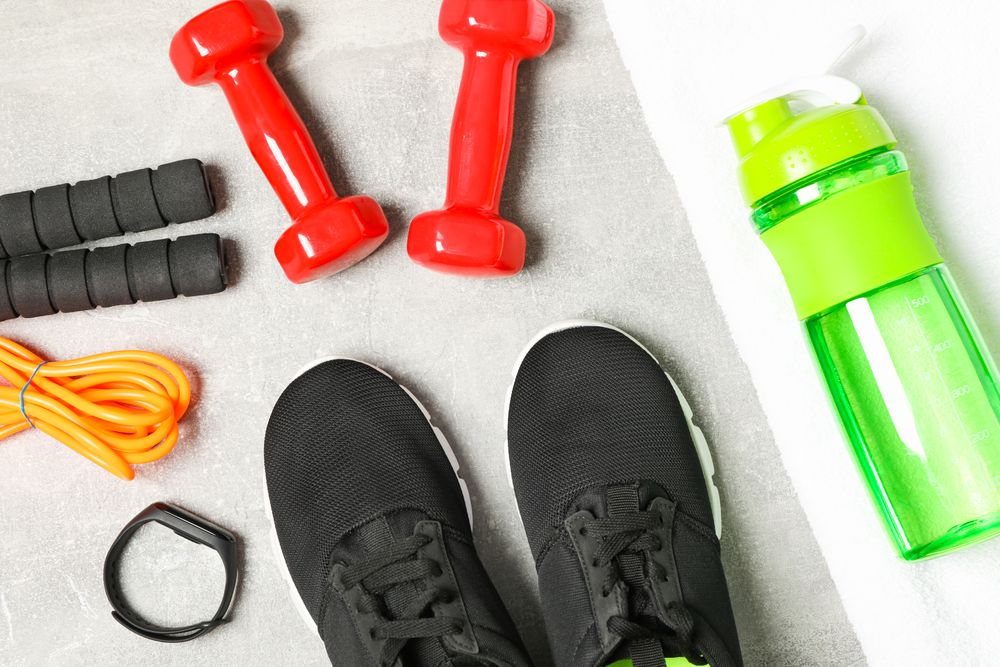Composition with healthy lifestyle accessories on grey background