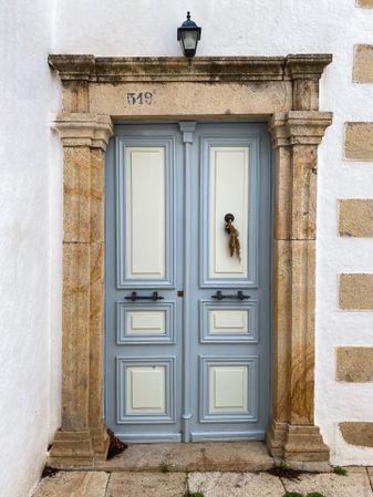 Patmian blue door with white painted panels