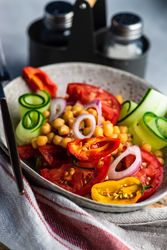 Healthy salad with organic vegetables and chickpeas