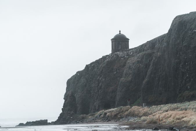 Old temple located on cliff in Northern Ireland coast