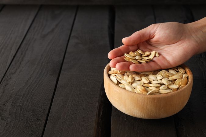 Fall season food - pumpkin seeds, space for text