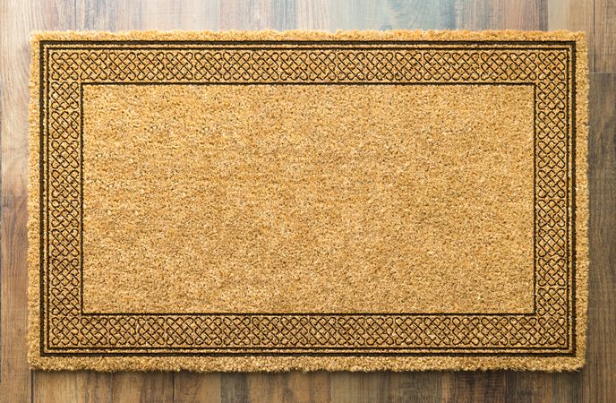 Blank Welcome Mat On Wood Floor Background Ready For Your Own Text