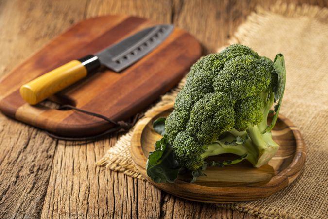 Green organic broccoli on the table.