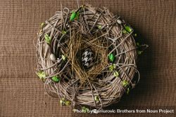 Decorated Easter egg in bird nest beyQpb