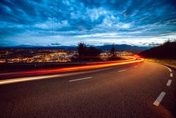 View of abstract shines on road at night