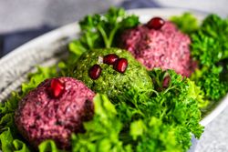 Close up of Georgian dish pkhali on a bed of lettuce