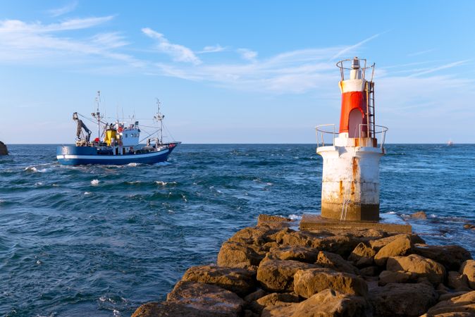 Lighthouse on rocky coastline