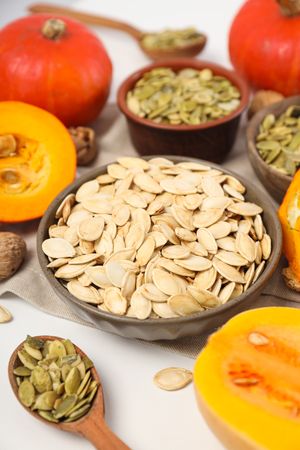 Cooking ingredients for fall season - pumpkin seeds, pumpkin