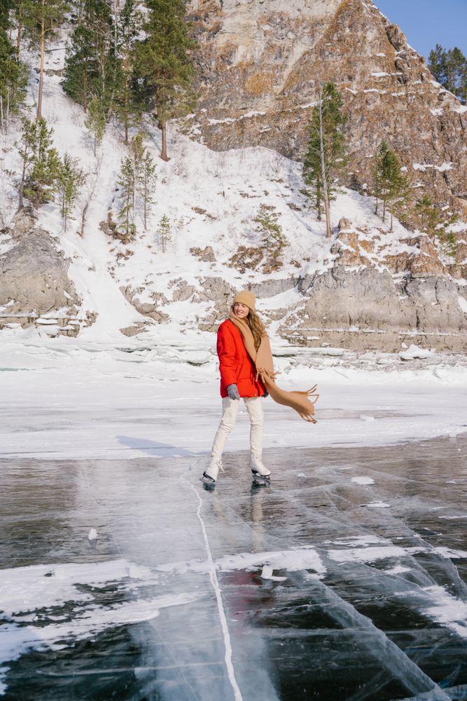 Woman skating on frozen river