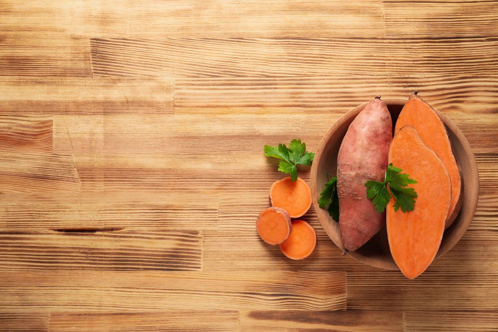 Concept of vegetables, sweet potato, space for text