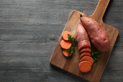 Concept of vegetables, sweet potato, space for text
