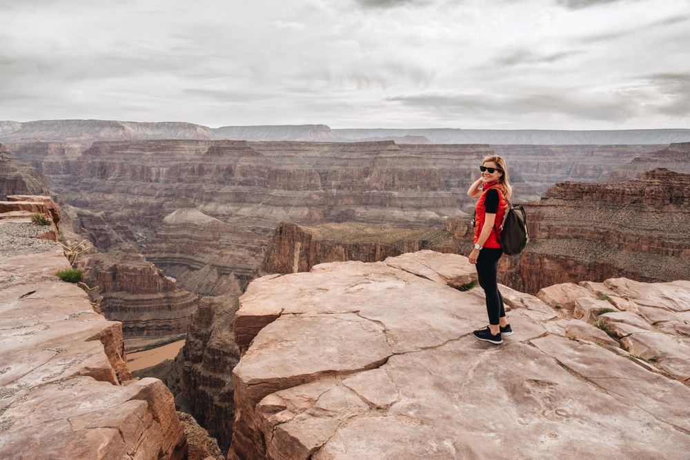 Calm female looking at pictorial landscape