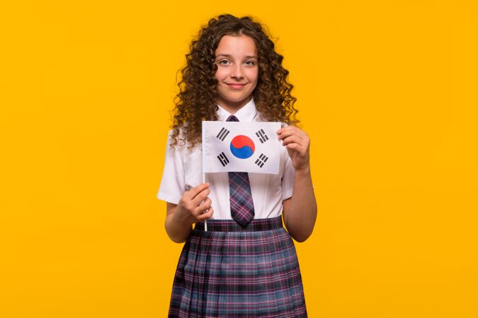 Girl posing with South Korean flag