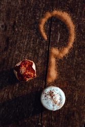 Cupcake near question mark and coffee