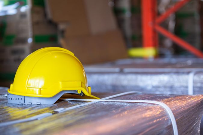 Hard hat resting on product in warehouse