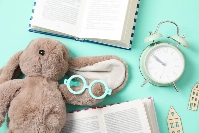 A children's book with toys on a light background.