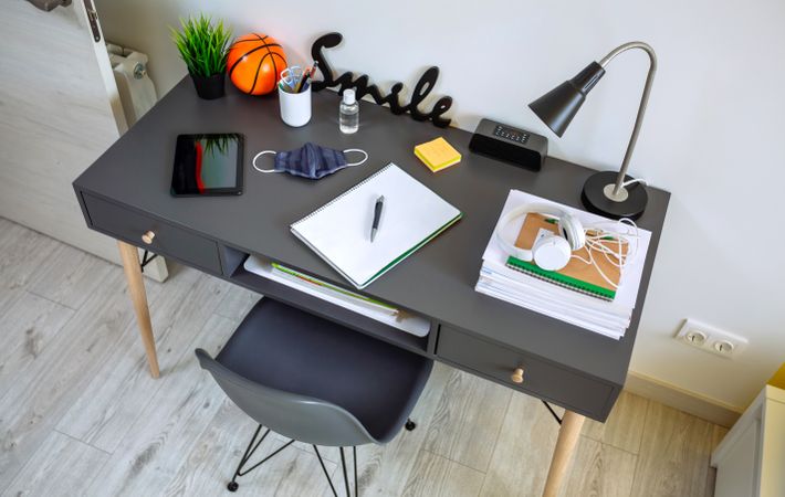 Youth bedroom interior with desk