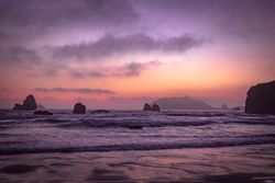 Rocks sitting out from Northern Californian coast at dusk