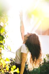 Cheerful woman in garden