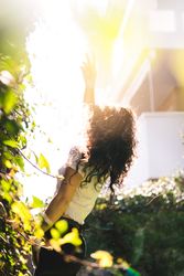 Cheerful woman in garden