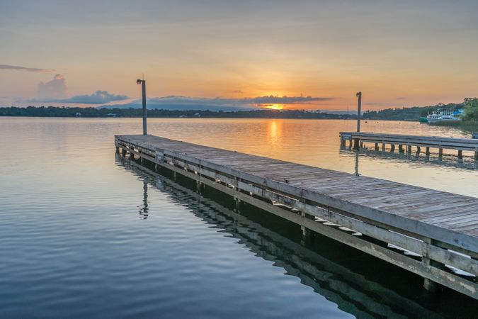 Shot of two docks during sunset